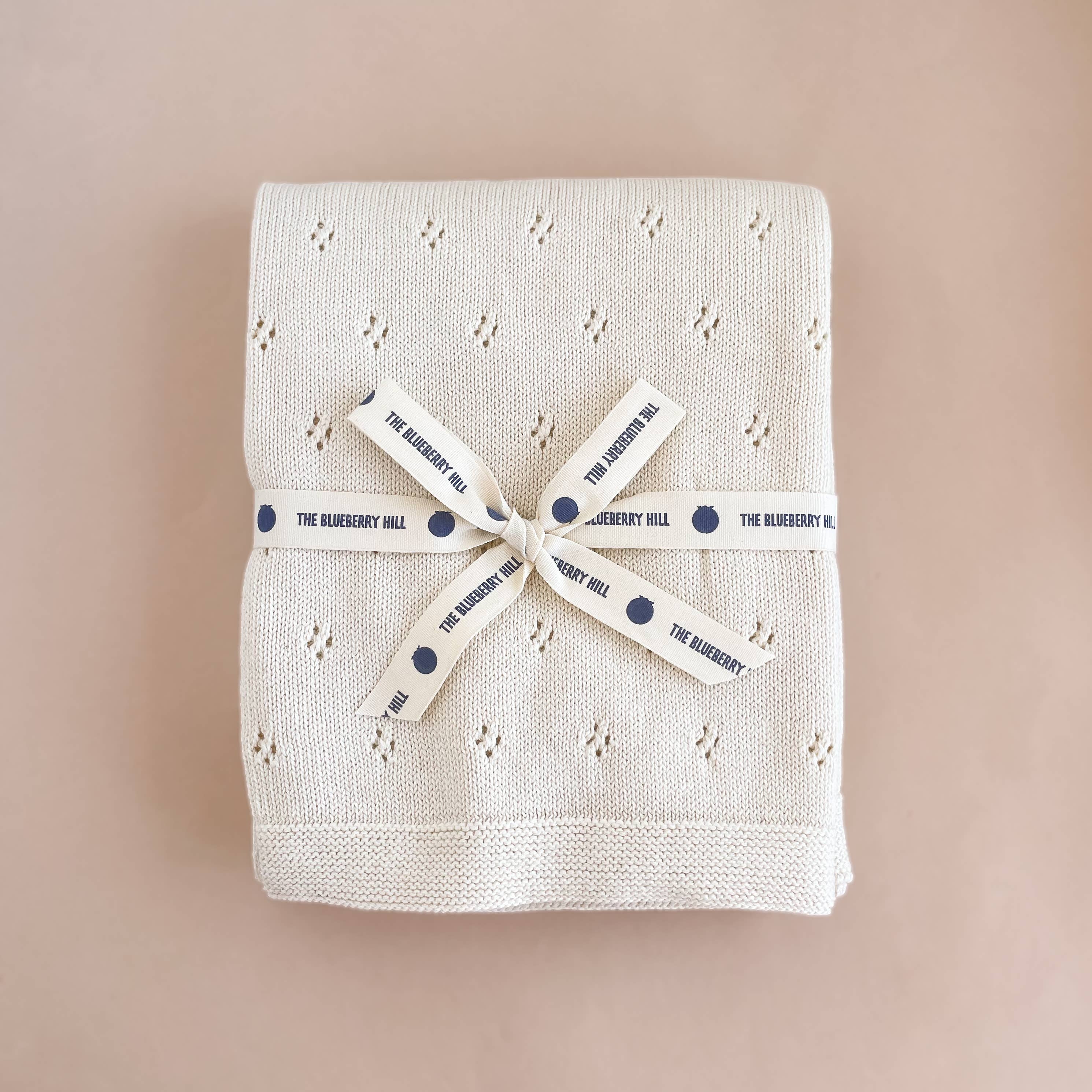 The Blueberry Hill Heirloom Pique Cream Organic Cotton Blanket